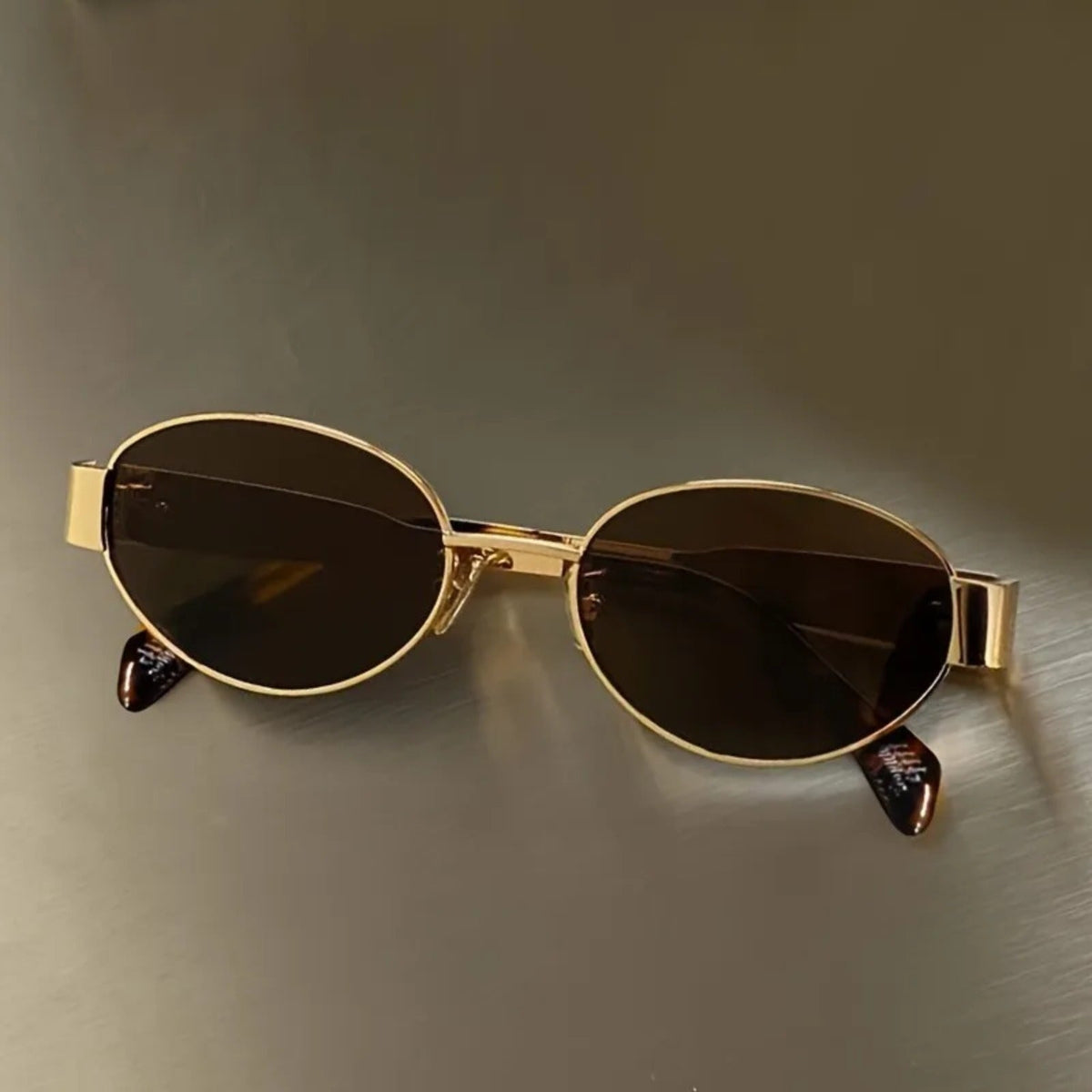
Gafas de sol ovaladas de aleación dorada con protección UV400