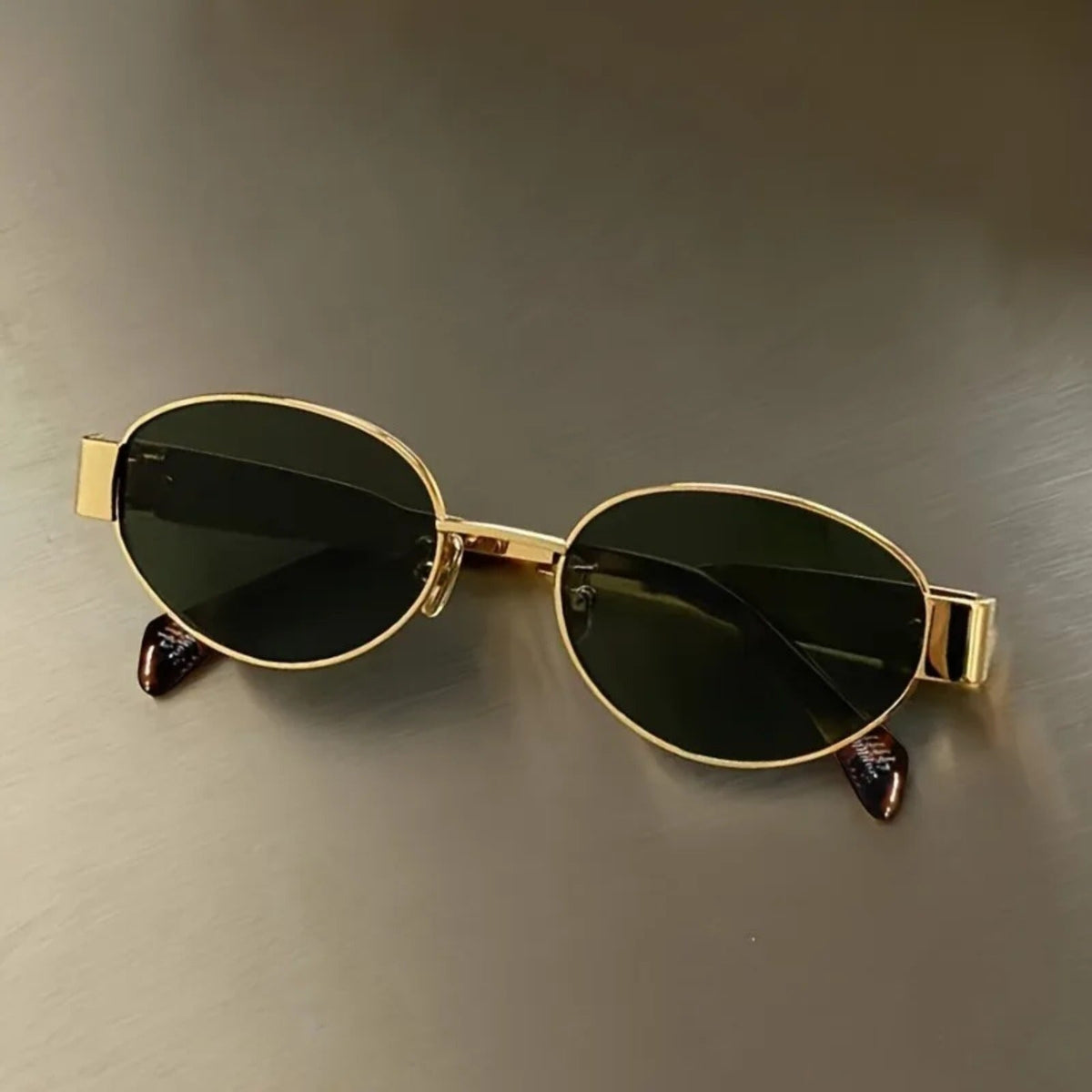 
Gafas de sol ovaladas de aleación dorada con protección UV400