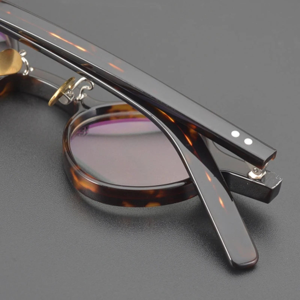 
Montura redonda de acetato con diseño patchwork