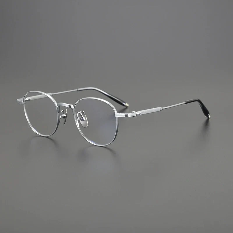 
Gafas redondas minimalistas de titanio