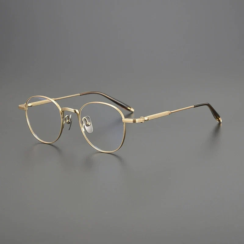 
Gafas redondas minimalistas de titanio - Oro