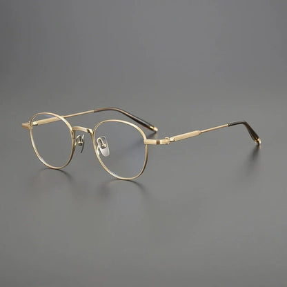 
Gafas redondas minimalistas de titanio