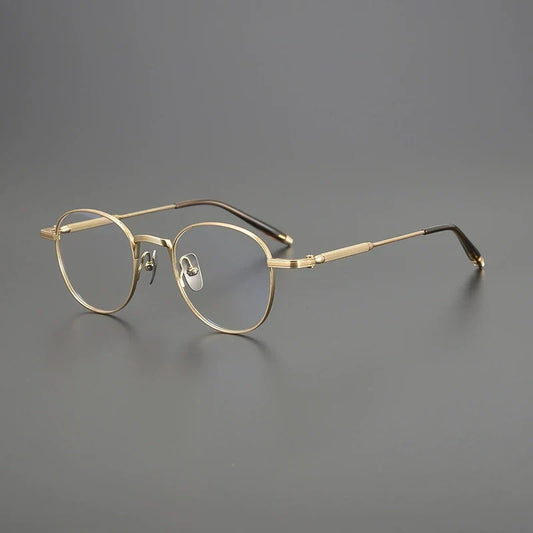 Gafas redondas minimalistas de titanio