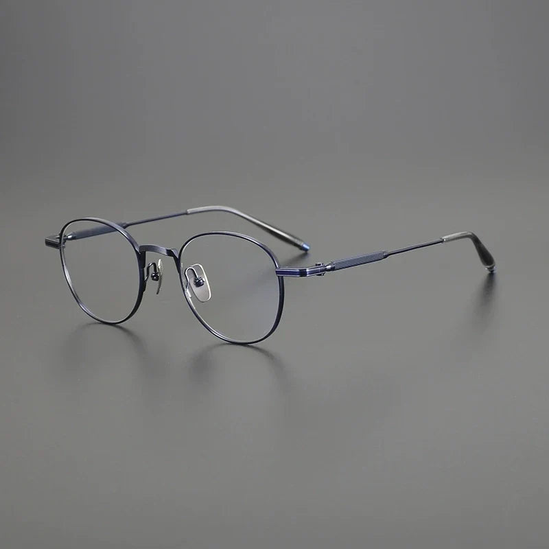 
Gafas redondas minimalistas de titanio