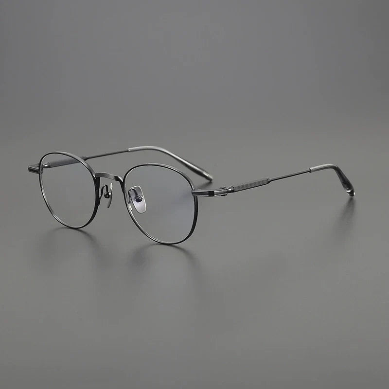 
Gafas redondas minimalistas de titanio