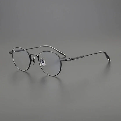 
Gafas redondas minimalistas de titanio - Imagen 3
