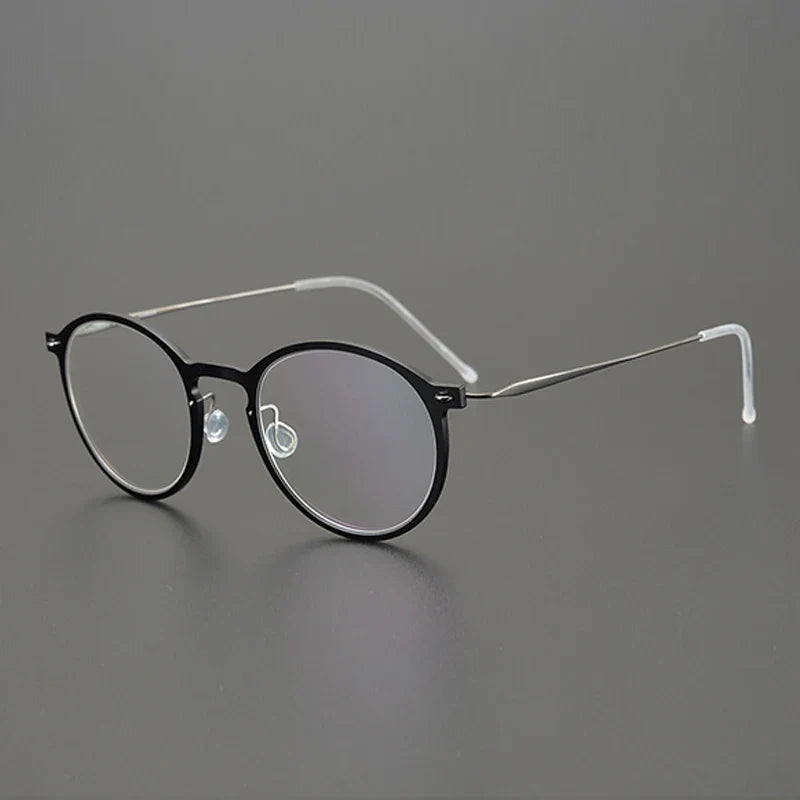 
Gafas redondas transparentes de titanio - Negro-plateado
