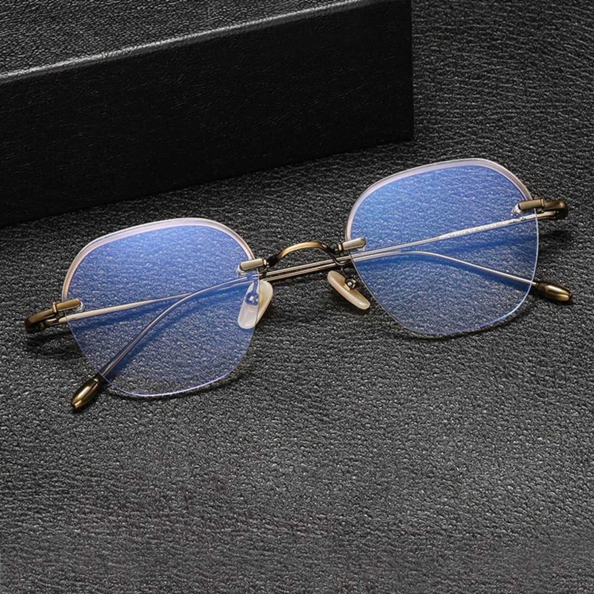 
Gafas geométricas de titanio sin montura - Imagen 3