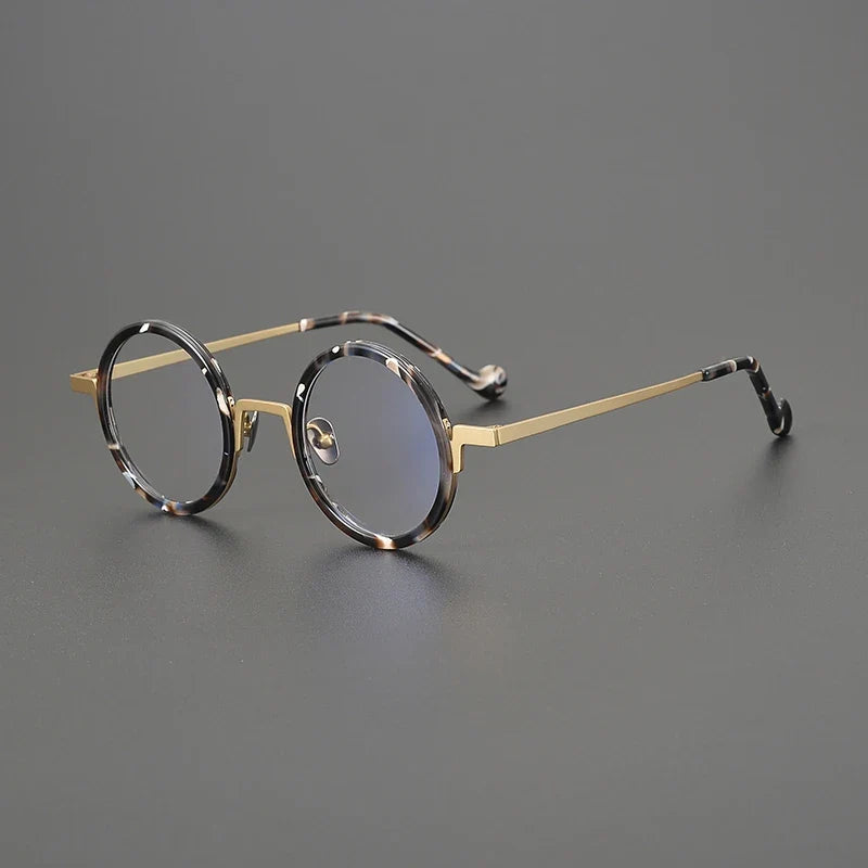 
Gafas redondas de titanio ámbar