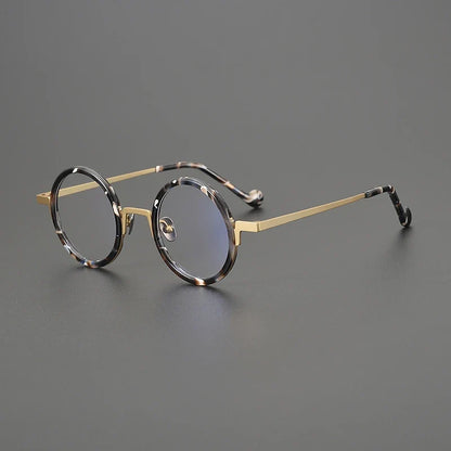 
Gafas redondas de titanio ámbar