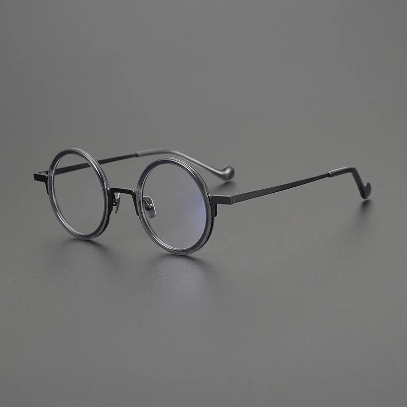 
Gafas redondas de titanio ámbar