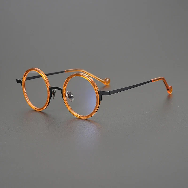 
Gafas redondas de titanio ámbar