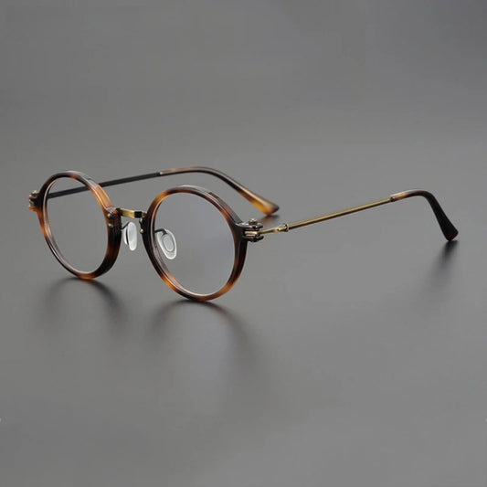 Gafas redondas de acetato y titanio