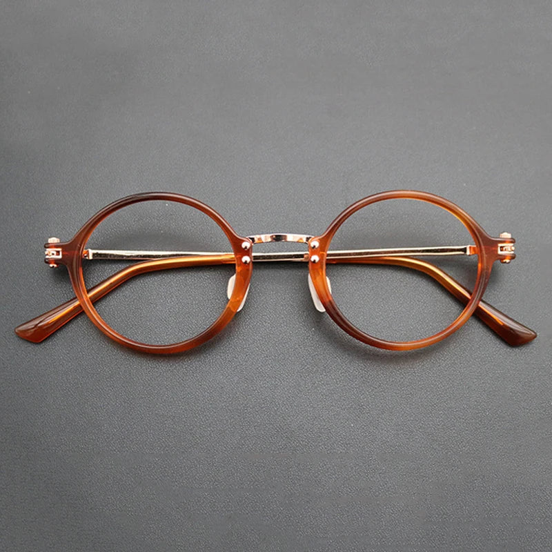 
Gafas redondas de acetato y titanio - Rojo