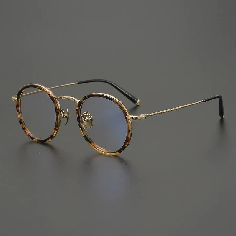 
Gafas redondas de titanio carey