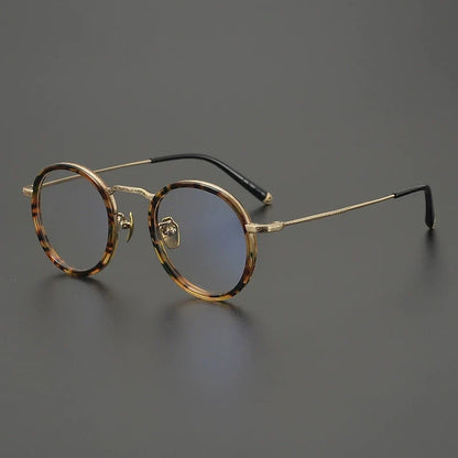 
Gafas redondas de titanio carey