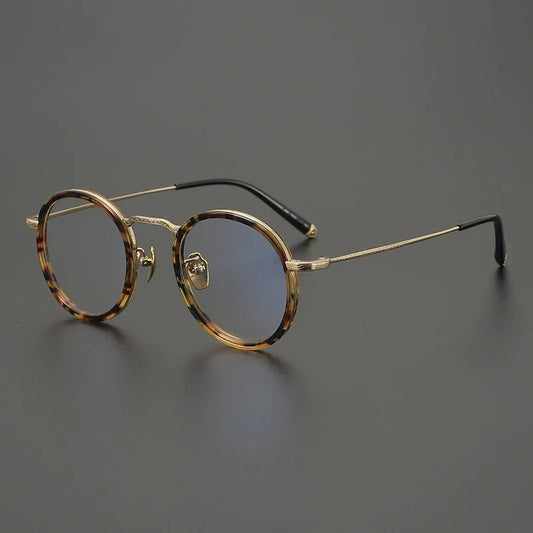 Gafas redondas de titanio carey