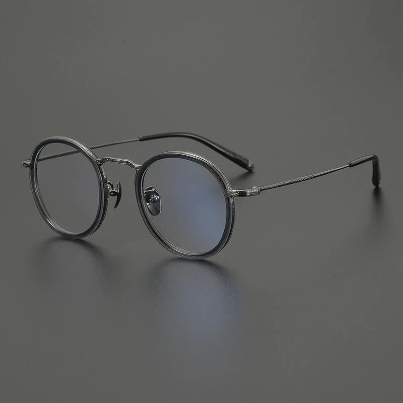 
Gafas redondas de titanio carey - Gris