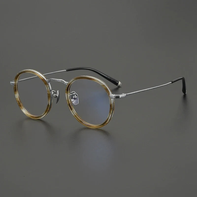 
Gafas redondas de titanio carey