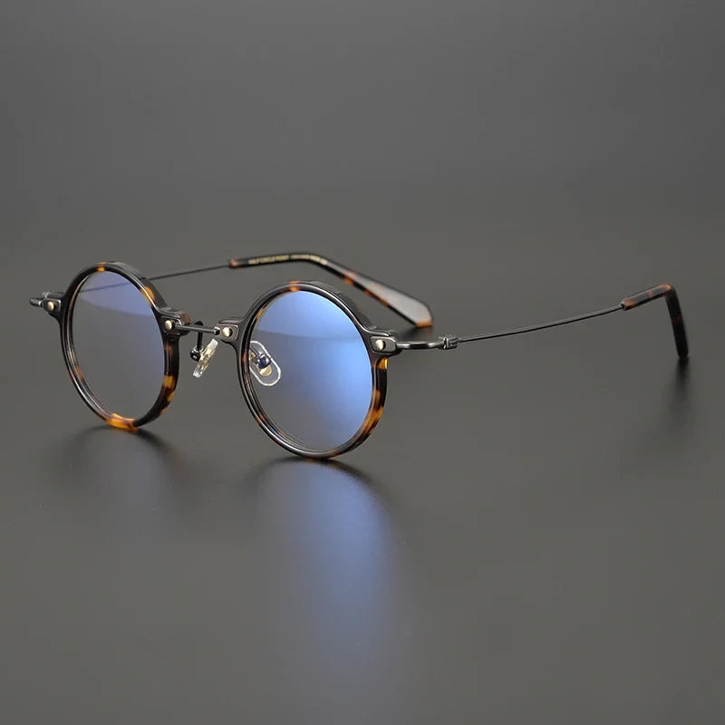 
Gafas redondas de acetato y titanio