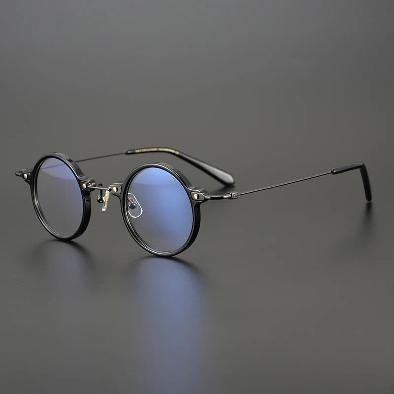 
Gafas redondas de acetato y titanio - Negro