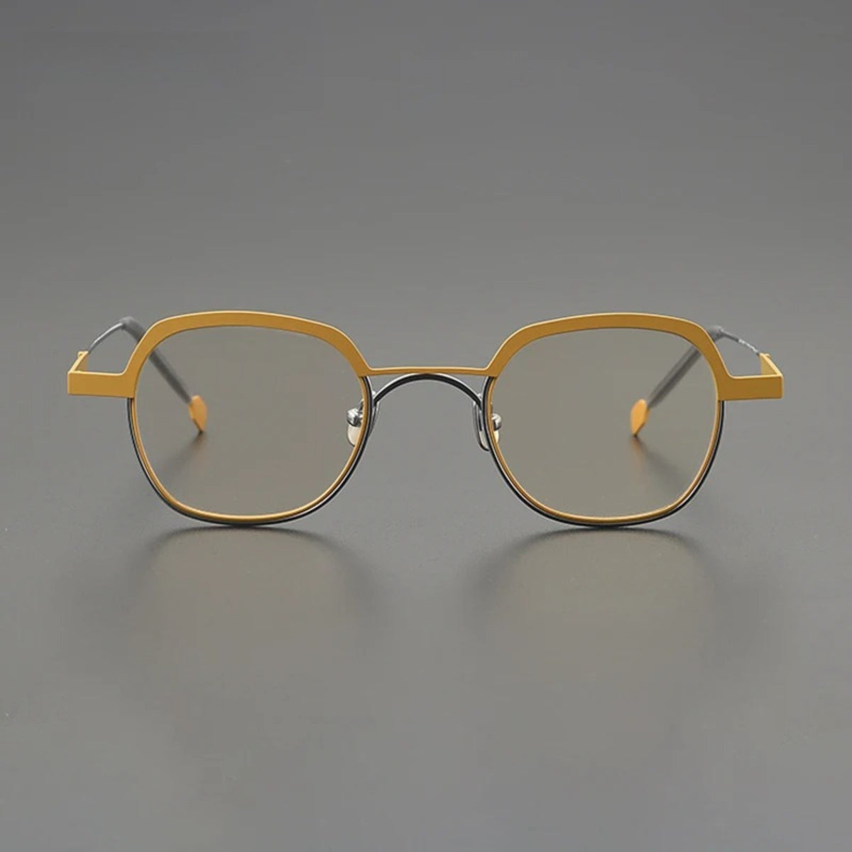 
Gafas geométricas de titanio color mostaza - Imagen 2