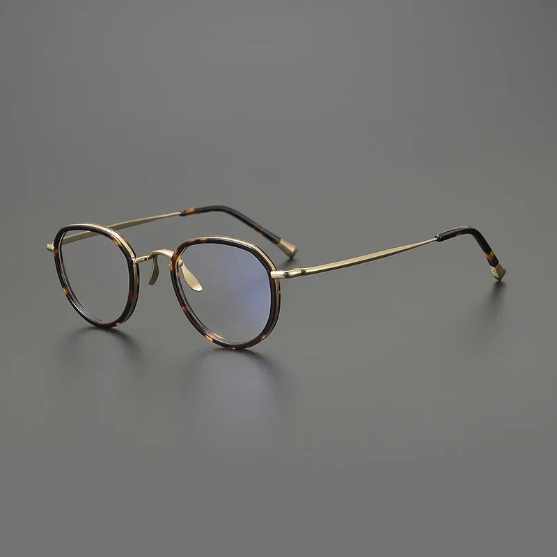 
Gafas redondas de titanio color oliva cristal