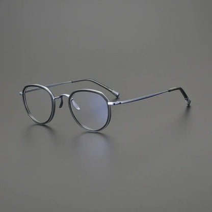 
Gafas redondas de titanio color oliva cristal - Imagen 6