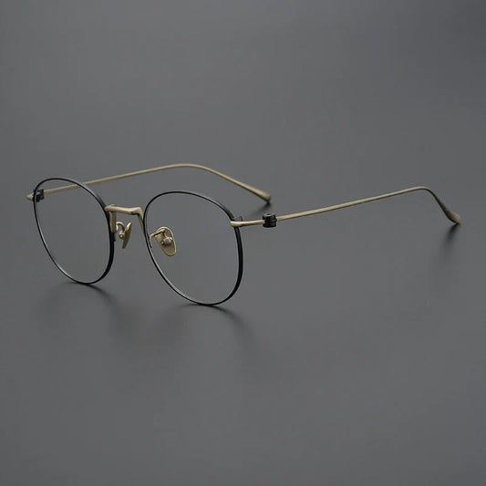 Gafas redondas de alambre de titanio