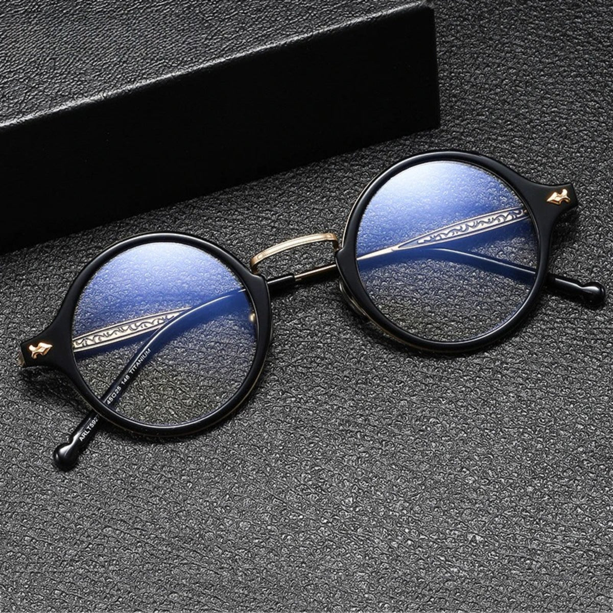 
Gafas redondas Windsor de acetato y titanio