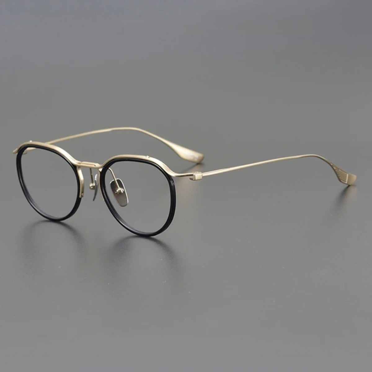 
Gafas redondas de titanio Windsor coreanas