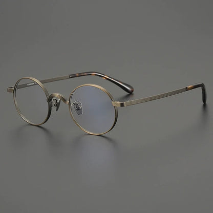 
Gafas redondas antiguas de titanio - Imagen 3