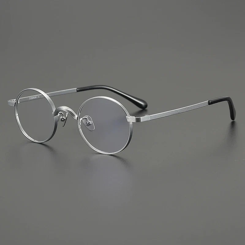
Gafas redondas antiguas de titanio - plata