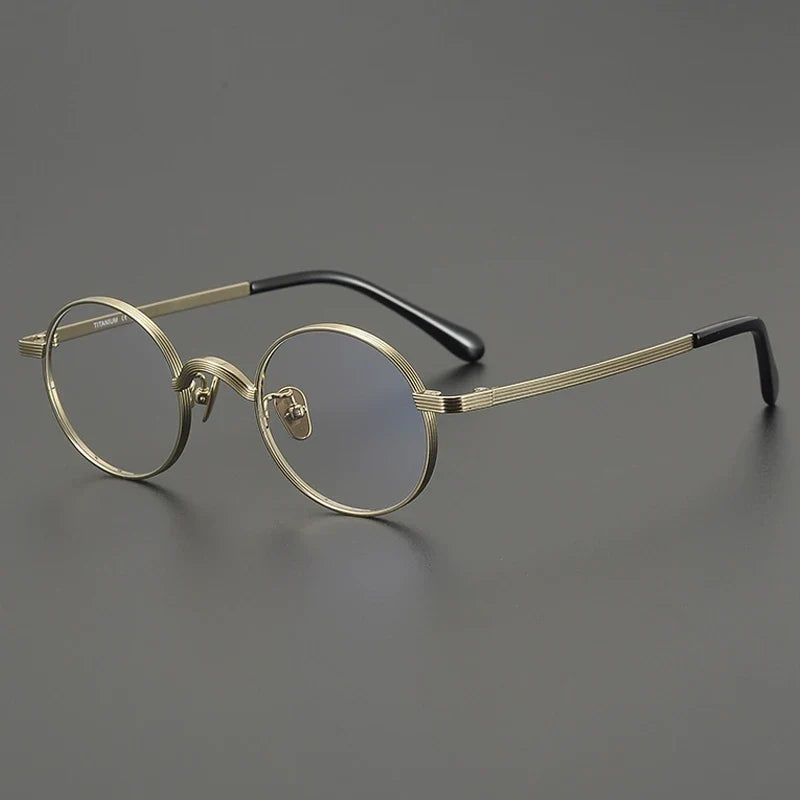 
Gafas redondas antiguas de titanio