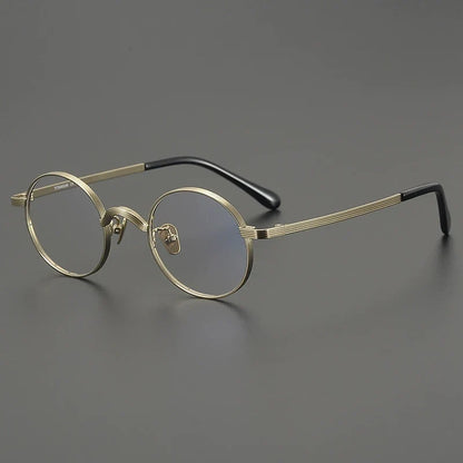
Gafas redondas antiguas de titanio