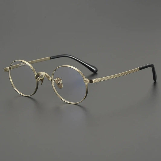 Gafas redondas antiguas de titanio