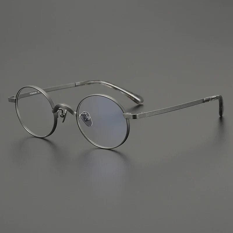 
Gafas redondas antiguas de titanio