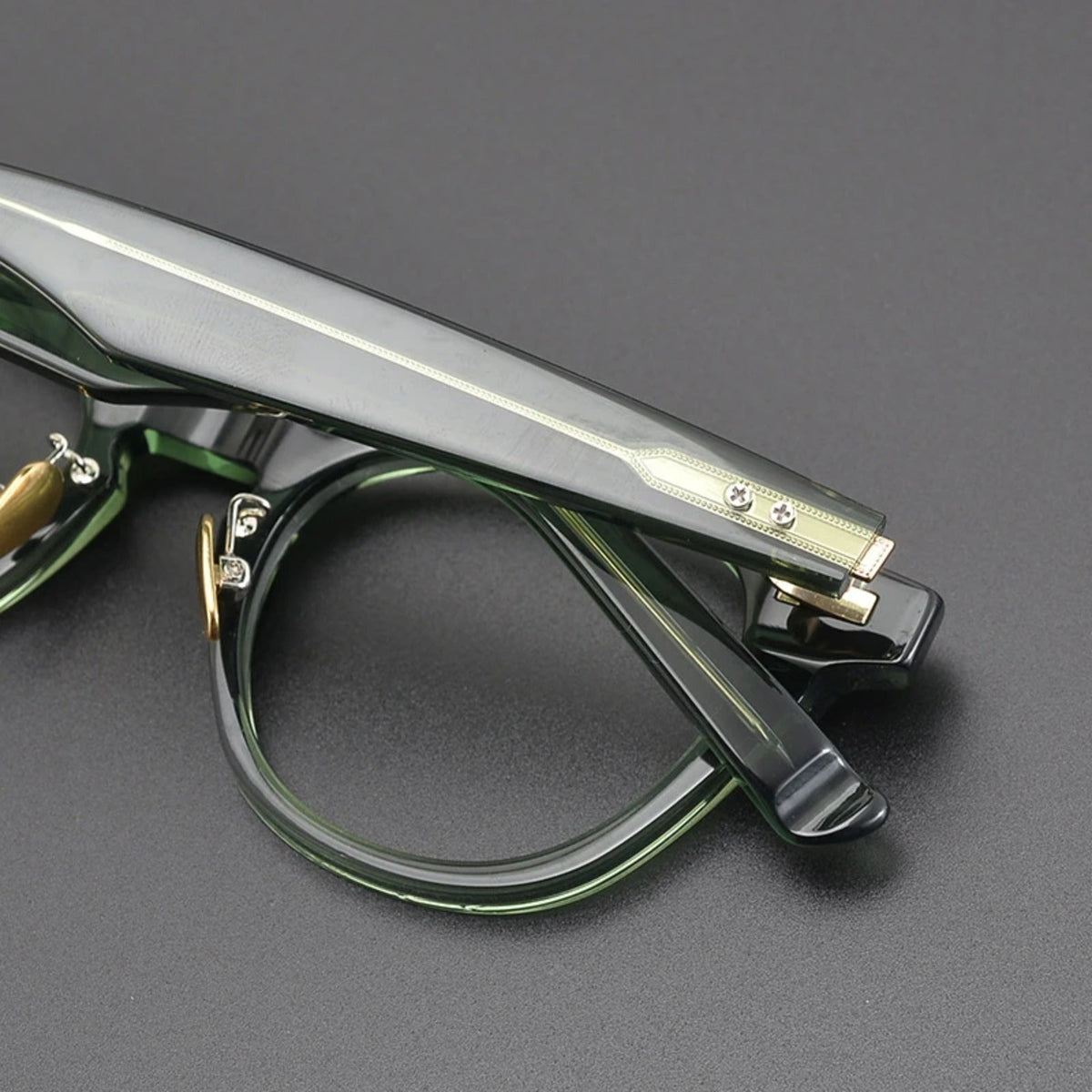 
Gafas de acetato japonés estilo panto con puente de cerradura
