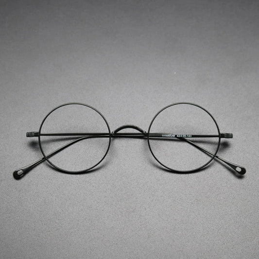 Gafas redondas de titanio de tamaño pequeño
