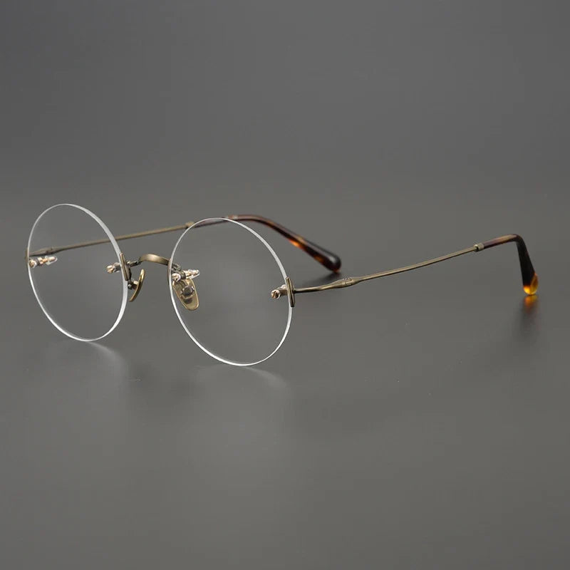 
Gafas redondas de titanio al aire