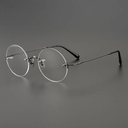 
Gafas redondas de titanio al aire - Imagen 3