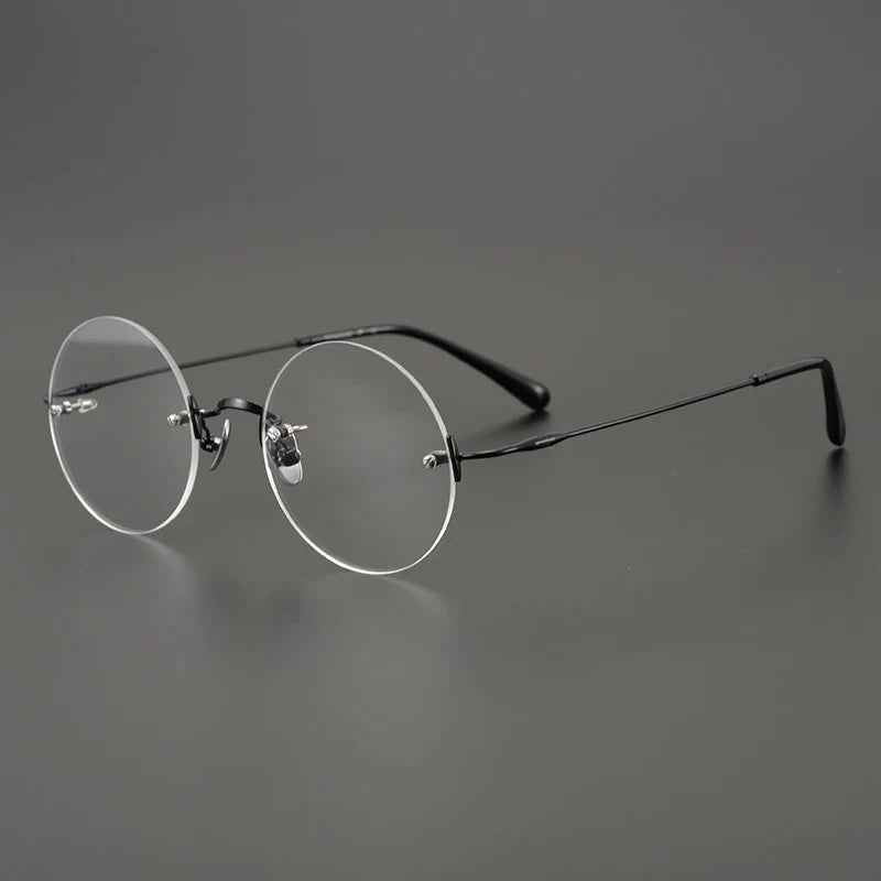 
Gafas redondas de titanio al aire - Negro