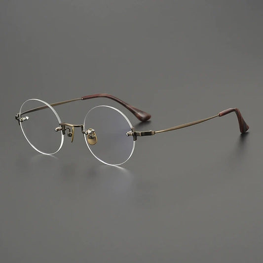 Gafas redondas al aire de  titanio hechas a mano