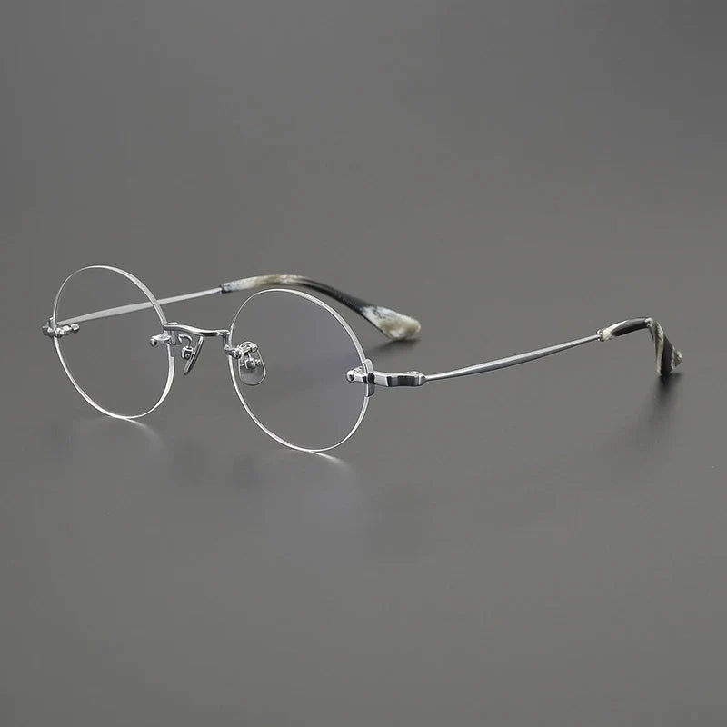 
Gafas redondas al aire de  titanio hechas a mano