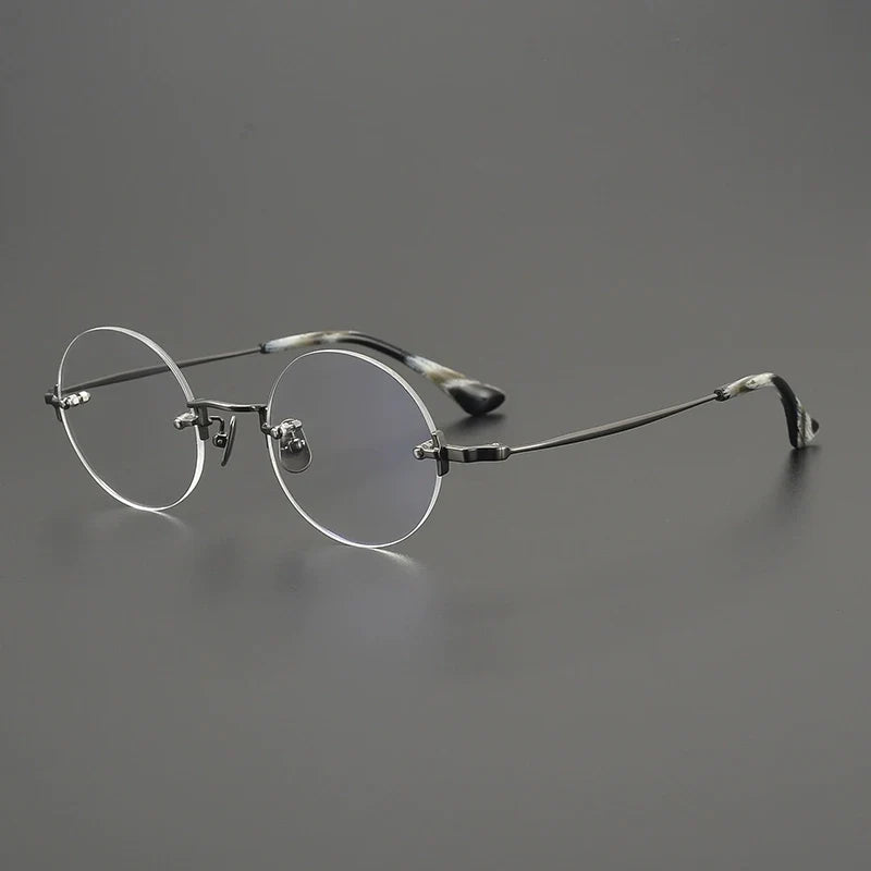 
Gafas redondas al aire de  titanio hechas a mano