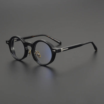 
Montura de gafas redondas retro de acetato con línea de cejas y almohadillas nasales esculpidas