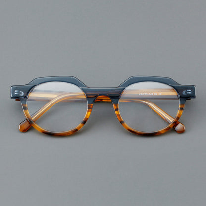 
Monturas de gafas geométricas tipo browline de acetato con lentes redondeadas y borde superior angular - Imagen 2