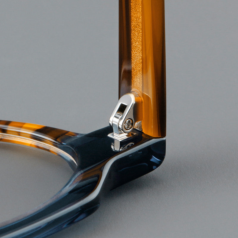
Monturas de gafas geométricas tipo browline de acetato con lentes redondeadas y borde superior angular - Imagen 6