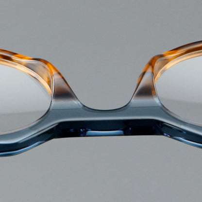 
Monturas de gafas geométricas tipo browline de acetato con lentes redondeadas y borde superior angular - Imagen 7
