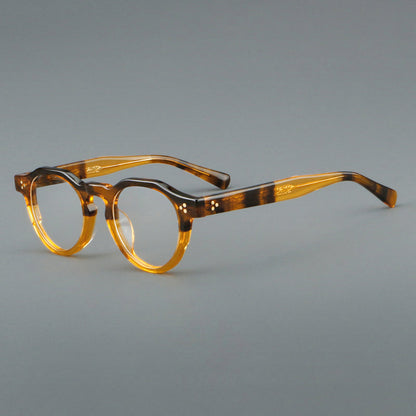 
Montura de gafas vintage redondas de acetato con puente de cerradura y detalle de tres remaches